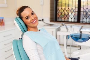 woman sitting on dental chair