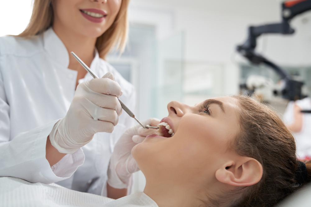 dentist for signs of implant failure